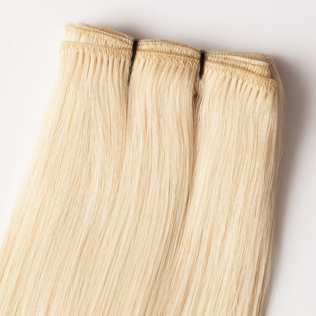 Weft extensions - Light Natural Blonde 60A